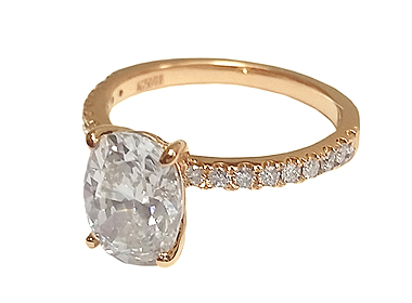 Oval Shaped Center Diamond Rose Gold Engagement Ring